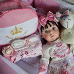 Bebê Reborn Real Brinquedo Menina Surpresa Baby Isa Floral Rosa