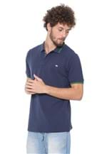 Ficha técnica e caractérísticas do produto Camisa Polo Triton Reta Logo Azul