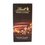 Ficha técnica e caractérísticas do produto Chocolate Lindt Swiss Classic Dark com Pedaços de Avelãs com 100g